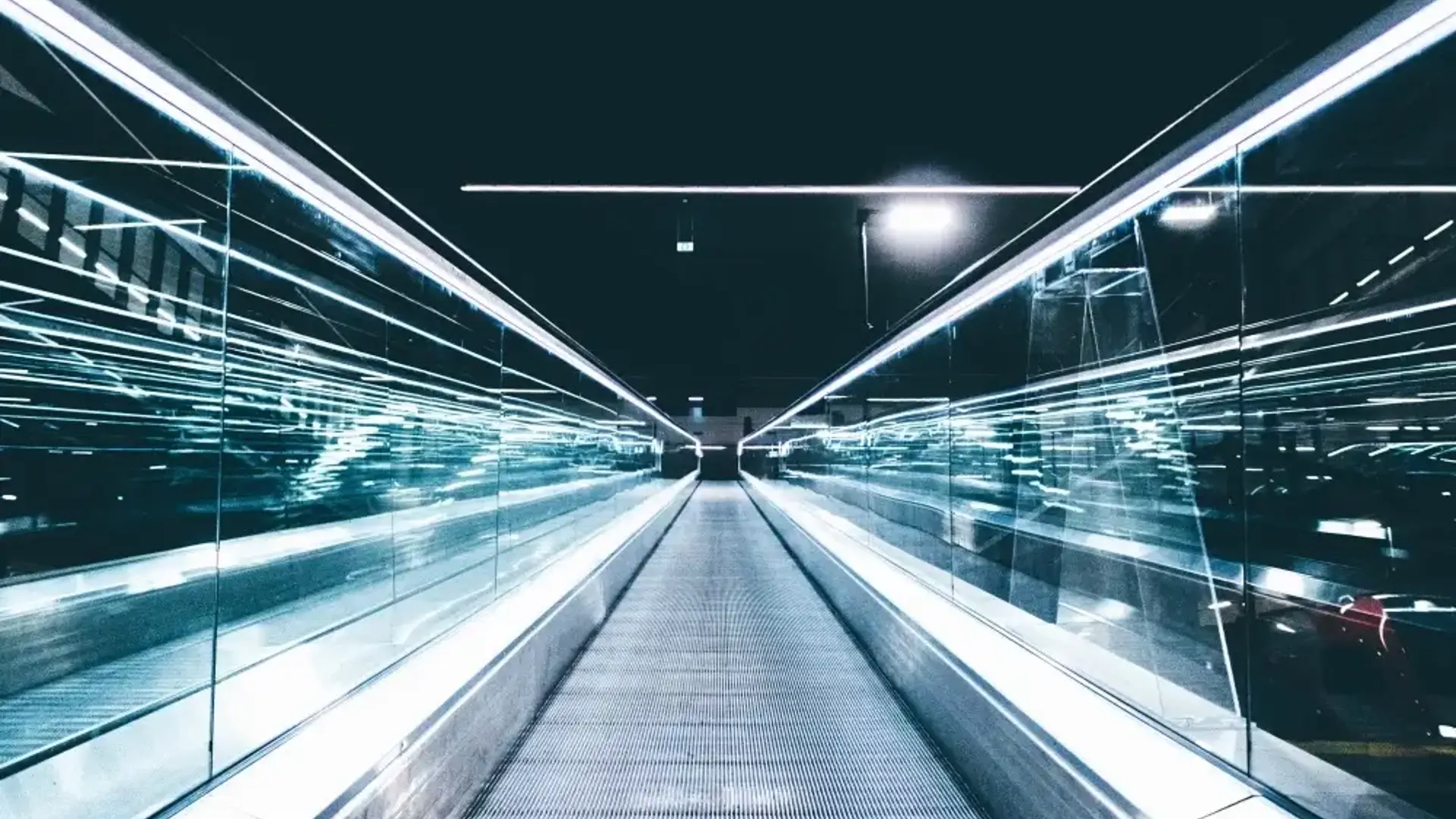 Walking escalator with bright lights