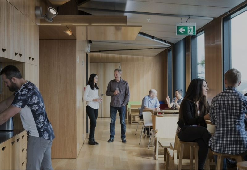 people standing in the Sandfield office