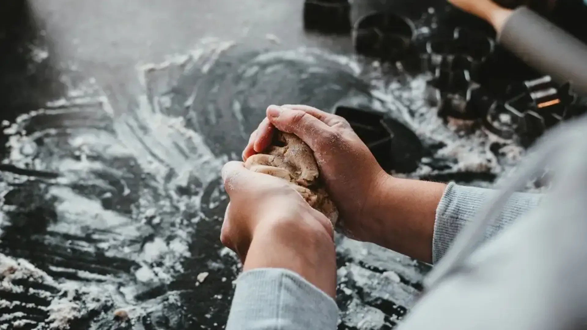 Rolling out dough on table