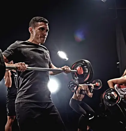 Man lifting weights in workout session