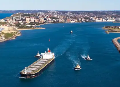 Ship pulling into port