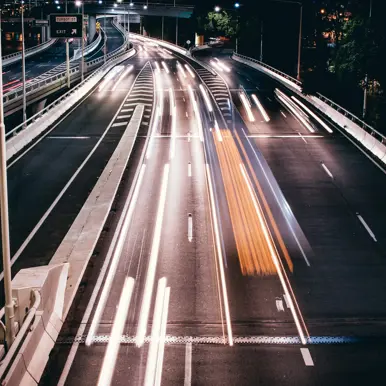 Road at night time with flashing lights