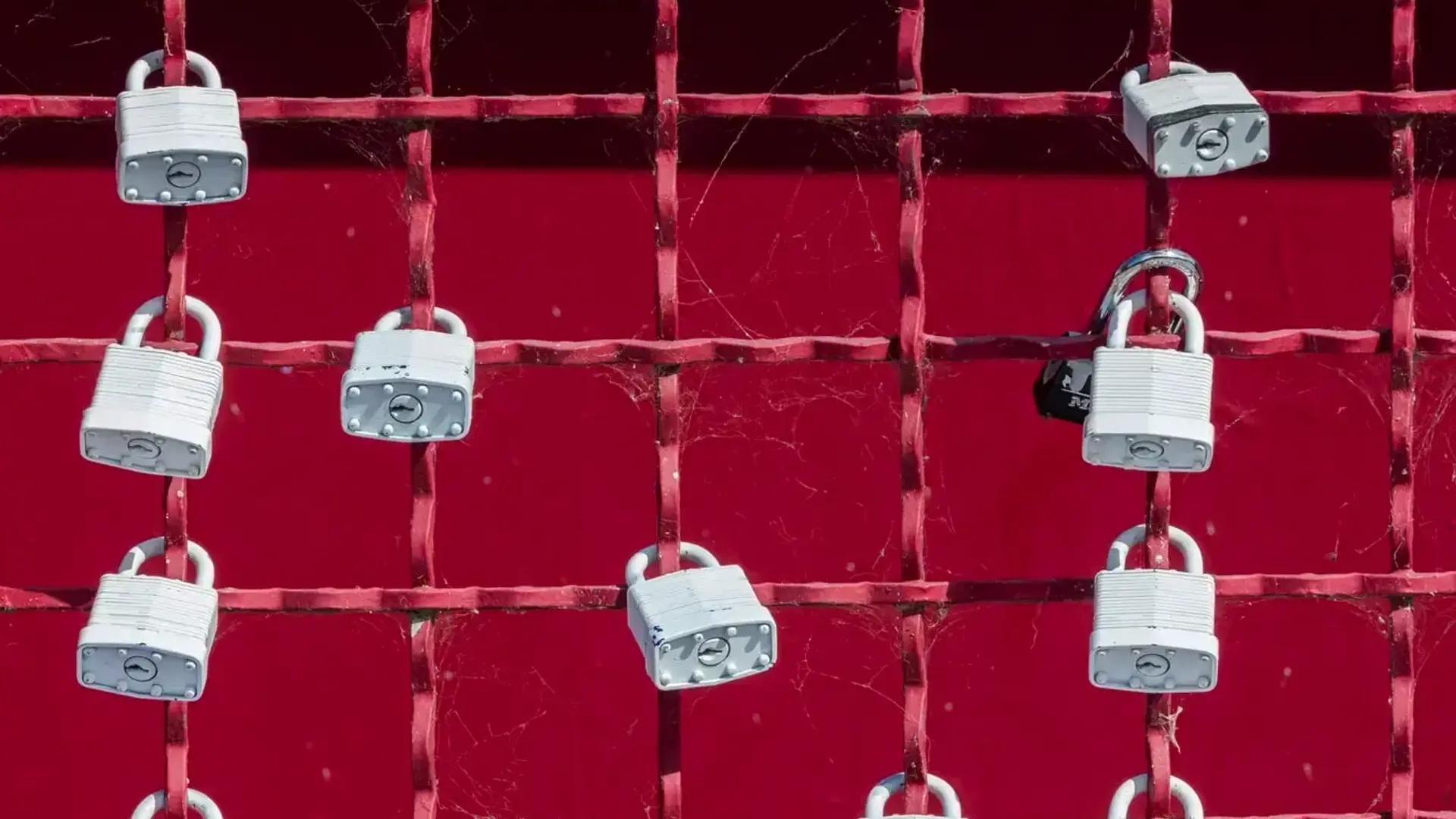 Red gate with locks