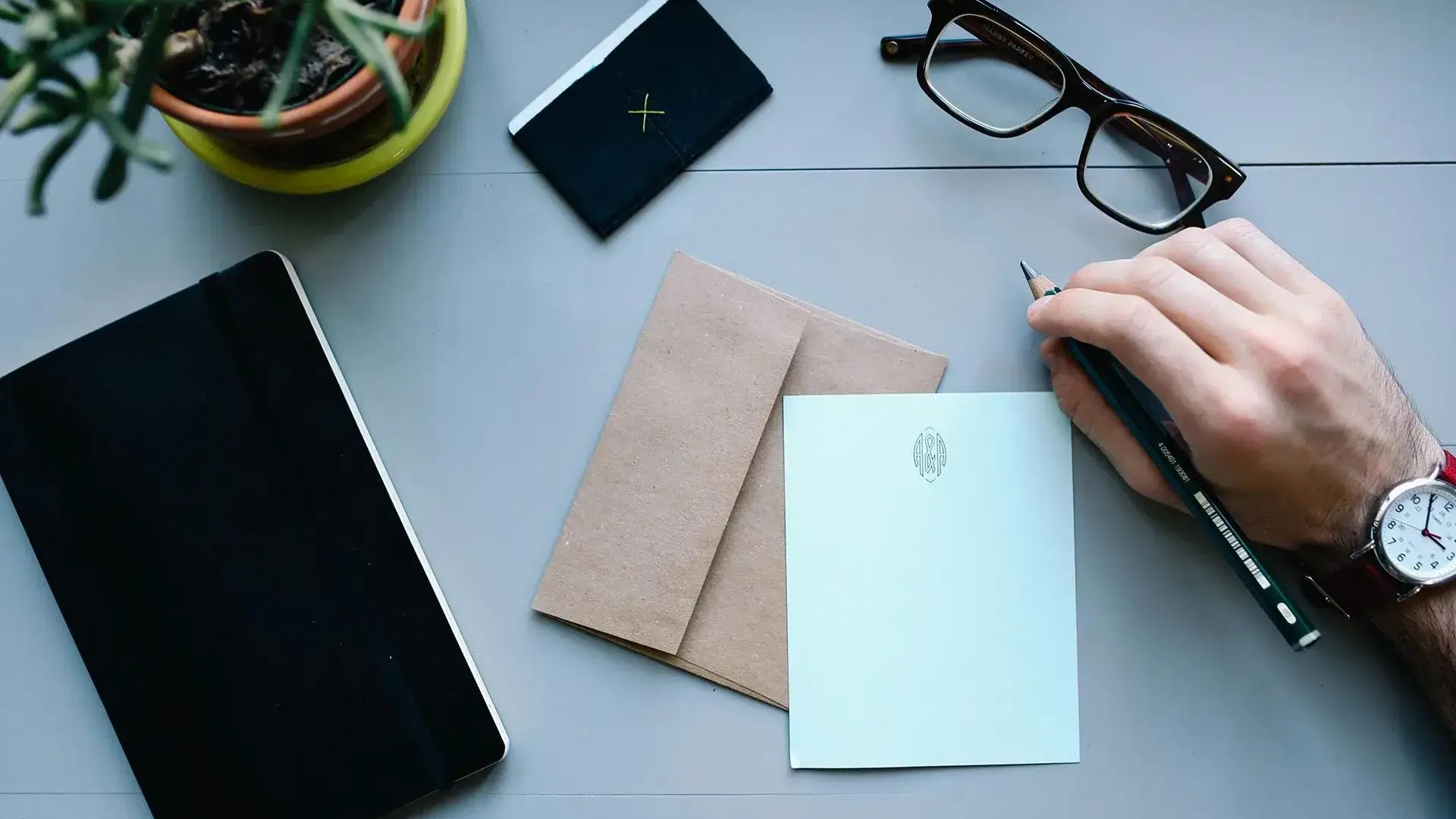 Office with glasses and notepad